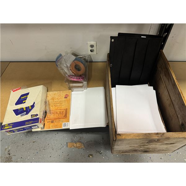 Wood crate with office supplies and beer and liquor tickets