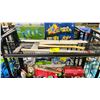 Image 1 : SHELF OF ASSORTED ITEMS INCLUDING; SLEDGE HAMMER, FIRE AXE, CALENDAR & MORE