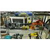 Image 1 : SHELF OF ASSORTED TOOLS INCLUDING; MAXIMUM BATTERY CHARGERS, BLACK & DECKER CORDLESS BLOWER,