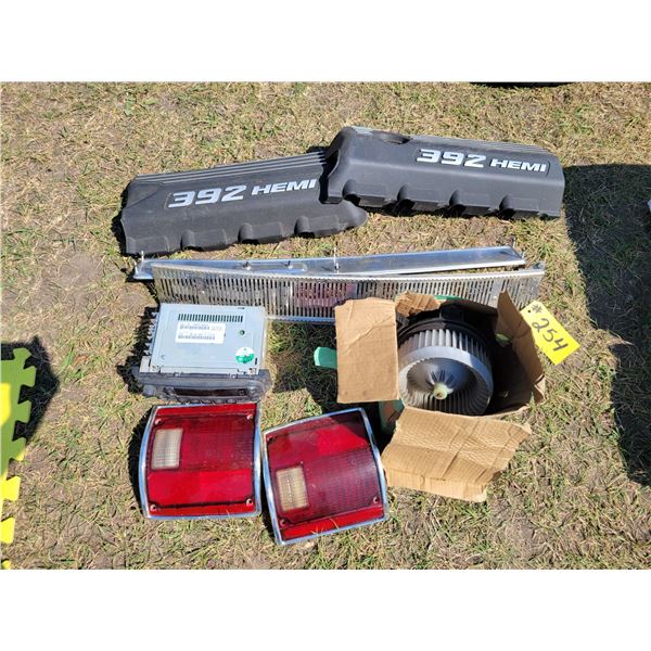 Dodge radio & blower motor, 2- 77 chev tail light lense, hemi covers & grill inserts