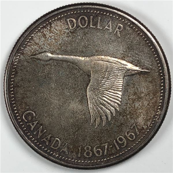 1967 Queen Elizabeth II Canadian Silver Dollar UNC Golden Tones
