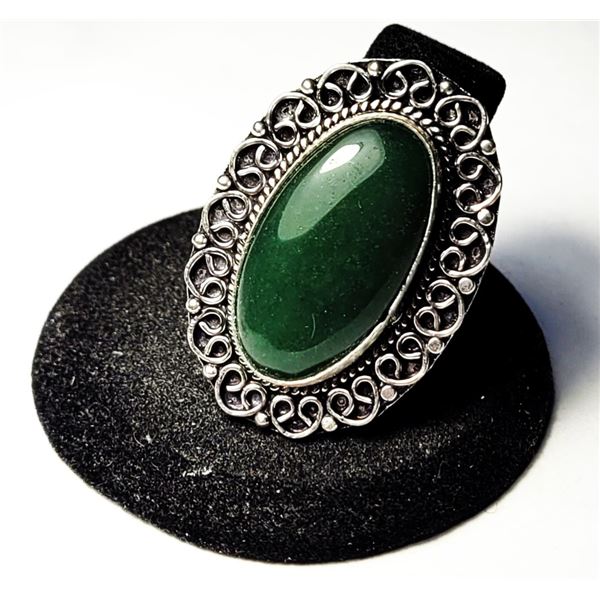 29)  NATURAL NEPHRITE JADE SIZE 9.5 RING WITH INTR