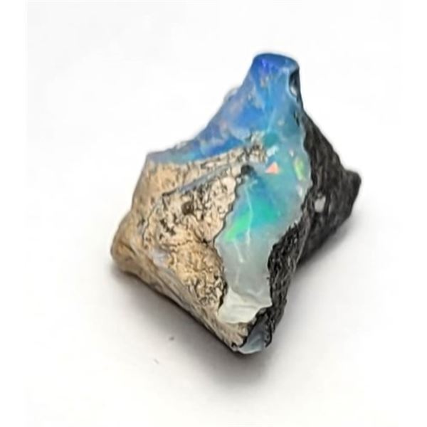 12)  NATURAL ROUGH BLACK OPAL GEMSTONE, 4.95 CT.