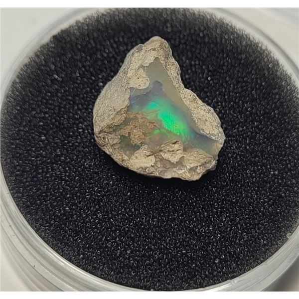 15)  NATURAL ROUGH 5.3 CT FIRE OPAL.