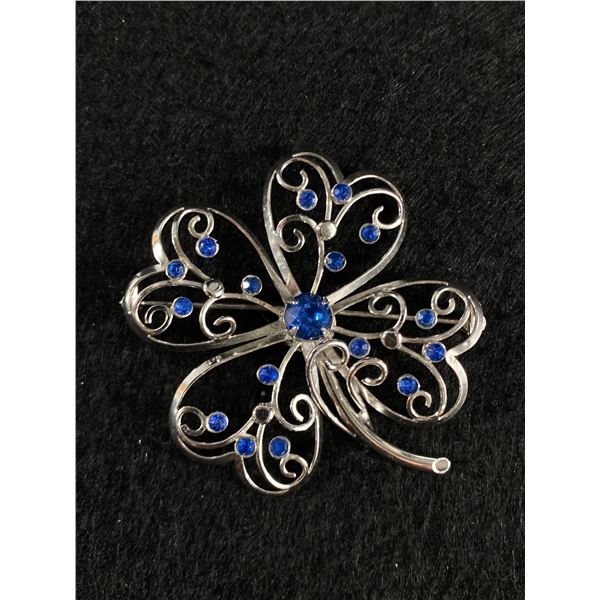 A Large Sterling Floral Brooch Set with Blue Stones