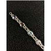 Image 2 : 925 Sterling Silver Bracelet with Genuine Garnet, Blue Topaz, and Amethyst Stones