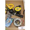 Image 1 : Gas saver gauge, flashlights, tape measure,