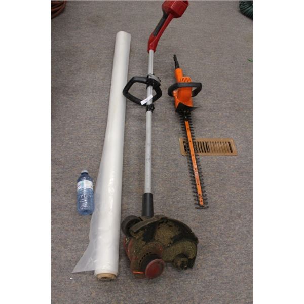 Roll of poly plastic, hedge trimmer