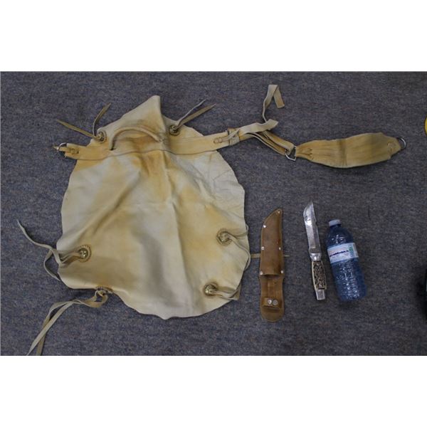 Knife, poker chips, flashlight, leather apron