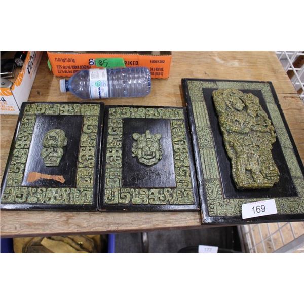 Carved wall plaque artworks