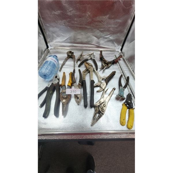 Various vise grips, pliers, wire strippers,
