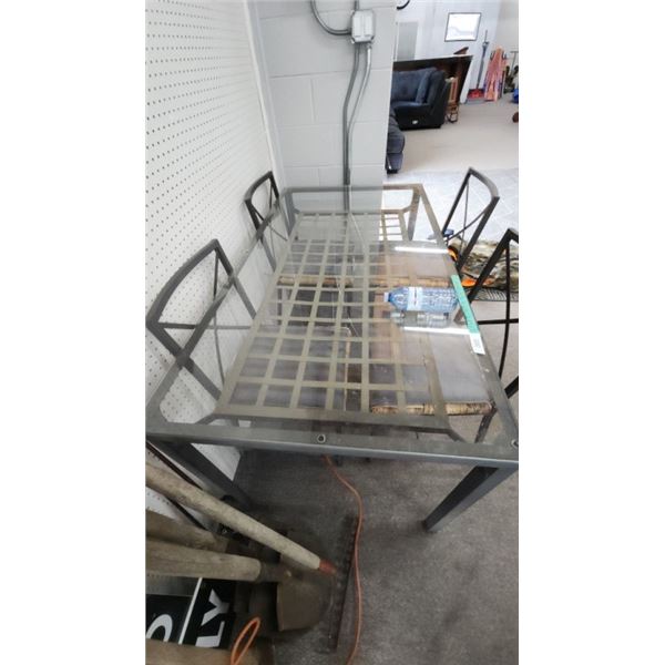 Outdoor glass table w/ 4 chairs 57 W x 31 D x 25