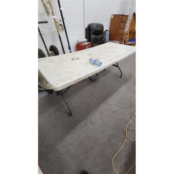 Plastic folding table