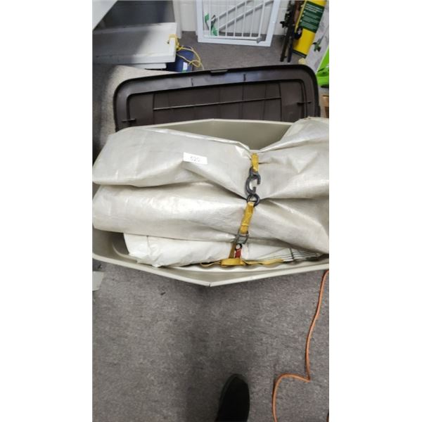 Tarp in plastic tub