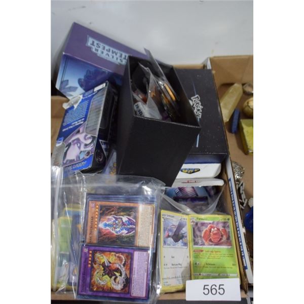 large lot of Pokemon cards, yu-gi-oh cards, dice