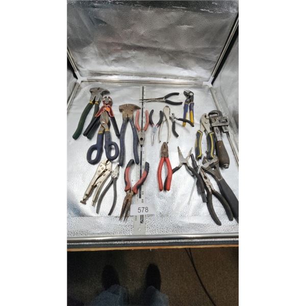Tin snips, cresent wrenches, pliers, pipe wrench