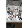 Tin snips, cresent wrenches, pliers, pipe wrench