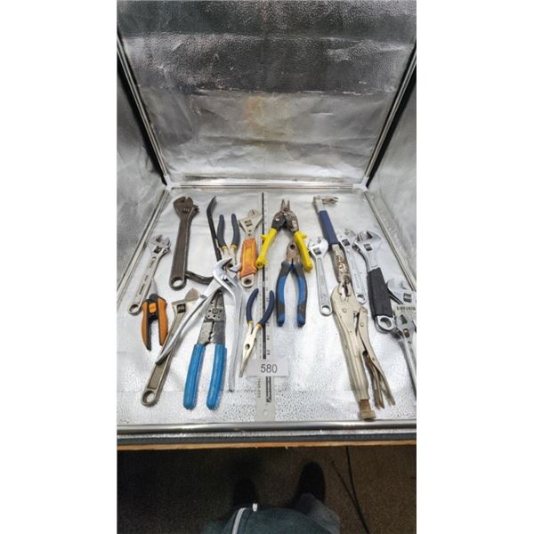 Cresent wrenches, tin snips, pry bar, pliers