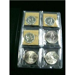 Lot of 7 coins: 3 - proof Ben Franklin 1/2 dollars, 61, 62, 63 and 4 - 1 oz silver coins (194)