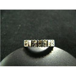 Diamond lady's ring, 10K white gold, round and baguette cut, approx. .20 carats, clarity VS1-I2, col