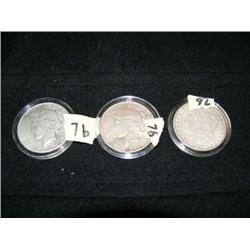 CHOICE on 2: 3 silver dollars: 1934 - San Francisco, 1935 - San Francisco, 1900 - Philadelphia (154)