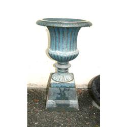 Approx. 1'8" cast iron urn on base (1)