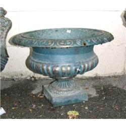 Approx. 1'2" cast iron urn (1)