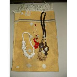 Lot of: Yellow and white woven blanket, wood bead necklace, red and white bead necklace, and white s