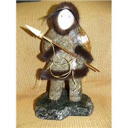 Soapstone hunter with ivory face on soapstone base by Michael Scott (2)