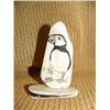 Image 1 : Scrimshawed puffin on fossilized ivory by Homer Cole '97 (2)