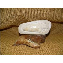 Relief carved salmon on bone with fossilized bone base (2)