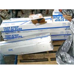Lot of tack strips and flooring staples (8)