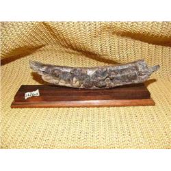 CHOICE on 2: fossilized ivory relief carvings on wood base: 4 wolves (2)