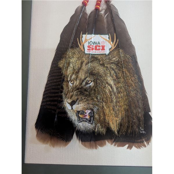 Turkey Feathers Painted with the African Lion and Iowa Chapter Logo