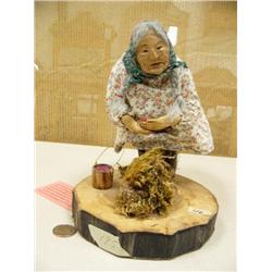 Wood faced and hand berry picking doll 9" tall (195)