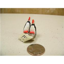 Pair of 1" ivory puffins by Mark Seeganna (2)