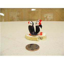 Group of 3 carved ivory puffins by Mark Seeganna of King Island