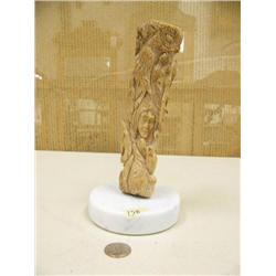 Mammoth bone carving of Indians, bears, sheep, fish, stags, eagles, wolves, saber tooth tiger, owl, 