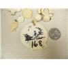 Image 2 : Lot of: 1 scrimshawed ivory pendant, 4 ivory pendant, 3 ivory rings, 3 pair ivory earrings, ivory ro