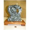 Image 1 : Soapstone carving on wood base 11" tall of whale and man intertwined (25)