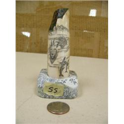5" scrimshawed fossilized ivory mounted on soapstone, scrimshawed with whales, eagles, etc (2)