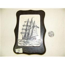 Fantastic scrimshawed triple masted sailing vessel by D.A.M, on whale bone mounted on wood, Alaska C