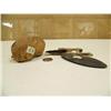 Image 1 : Fossilized whale ear drum, slate artifact ulu blade, ancient seal harpoon (2)