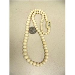 CHOICE on 4 ivory necklaces: 22" graduated bead necklace (196)