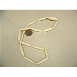 CHOICE on 4 ivory necklaces: 22" bead necklace (196)