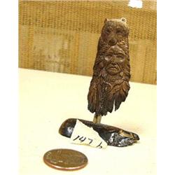 CHOICE on 4: relief carvings on mammoth ivory: Indian Chief and bear (2)