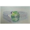 Image 1 : Peridot and diamond lady's ring, 14K white gold, peridot oval, faceted, approx. 2 carats, transparen