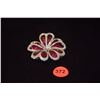 Image 1 : 18K WG RUBY & DIAMOND BROOCH, OPEN FLOWER W/HEART-SHAPED PETALS, THE PETALS EMBELLISHED W/210 INVISI