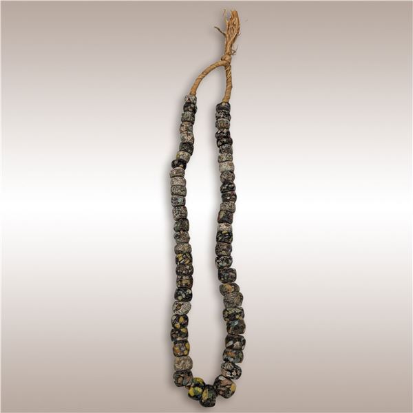 A Large String Of West African Venetian Glass "End-of-Day" Beads, 54 Beads Total
