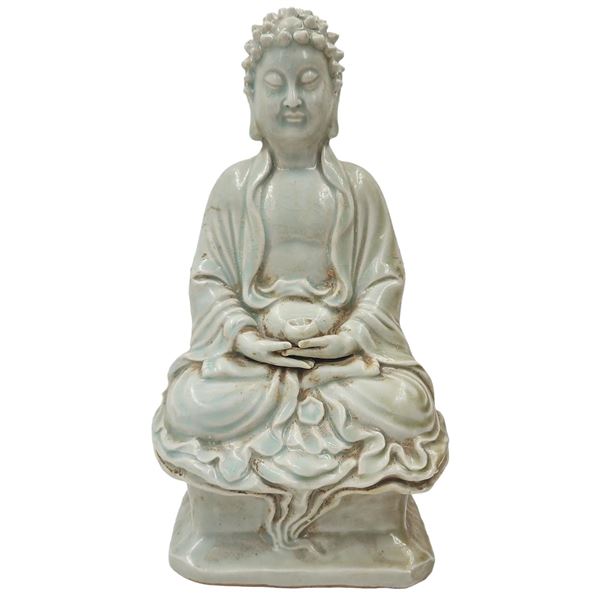 A Seated Celadon Porcelain Buddha